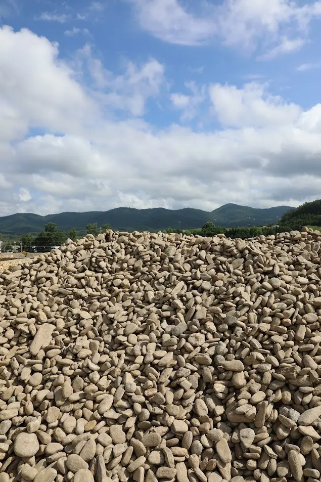 3-5 Inch River Rock Pile in Stone Yard