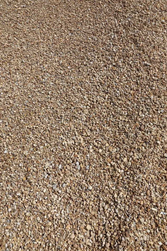 #57 Pea Gravel Pile in Stone Yard