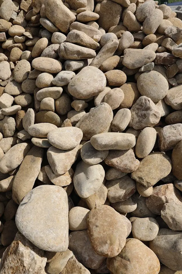 6-12 Inch River Rock Pile in Stone Yard